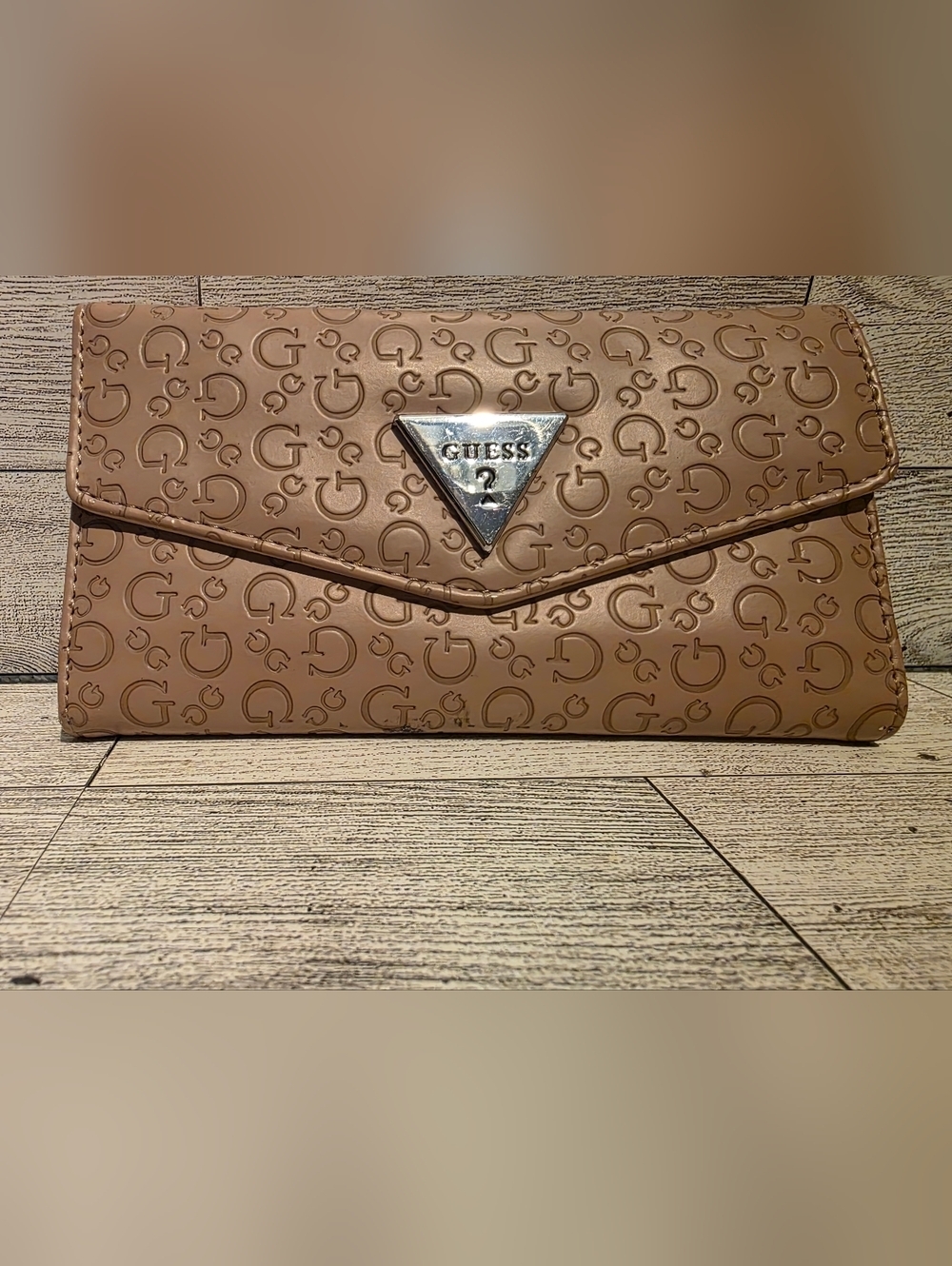 GUESS Tan Embossed Logo Envelope Wristlet with Silver Triangle Emblem